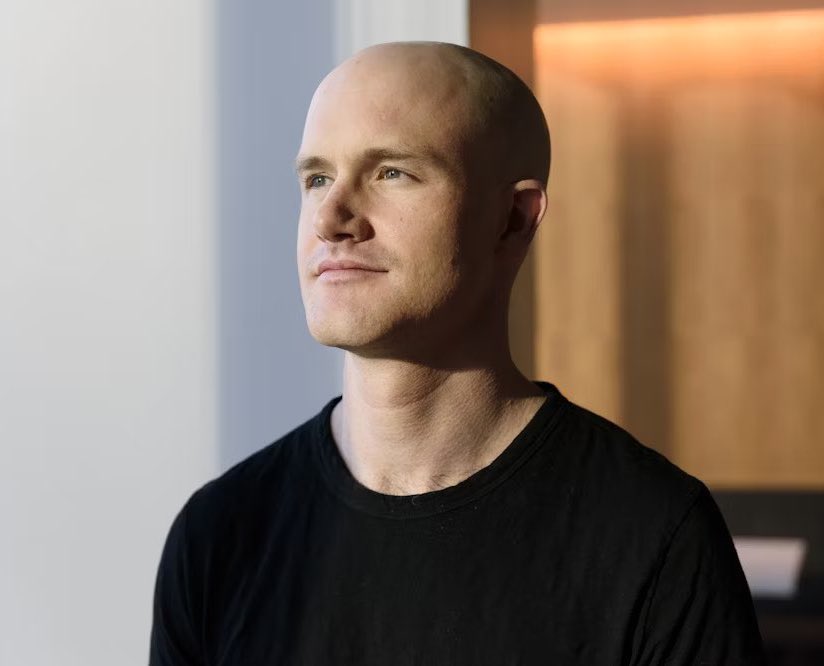 Coinbase Cuts 14% of Staff in Push to Go 'AI-Native'